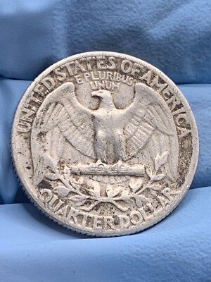 1959 quarter off-center strike error coin showing design shifted to one side with visible blank crescent and date